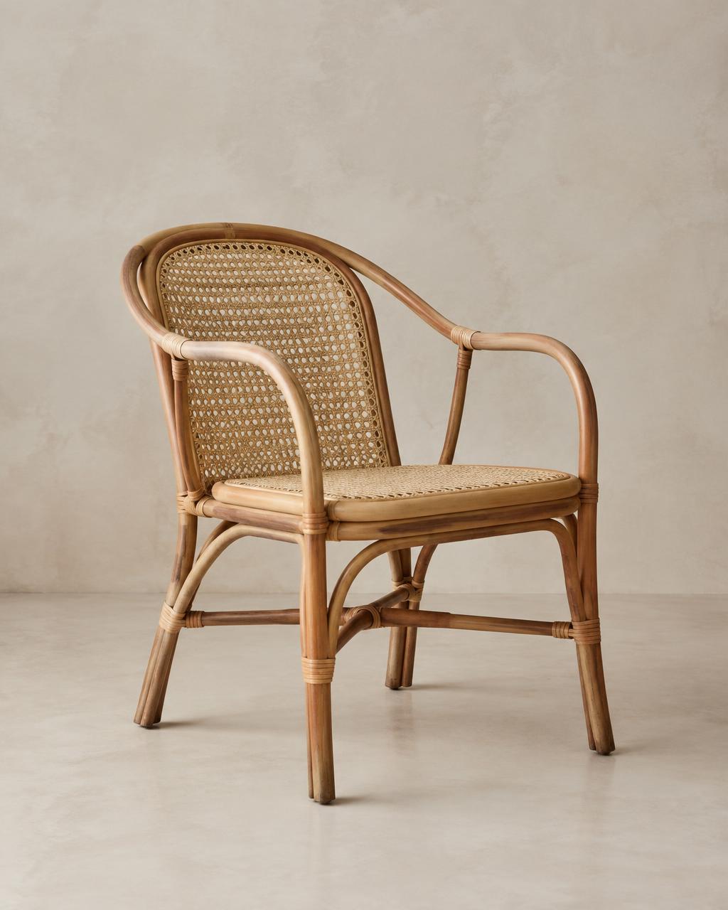 Natural rattan armchair with woven cane seat and back